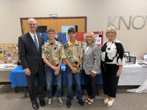 Senator Hutchinson with Eagle Scouts Jackson Jungling and Josh Rennick, Rep. Mustello, and Commissioner Osche.