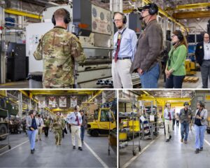 Senator Hutchinson Alt Text with Senator Mastriano inside a factory setting listening to tour guide.